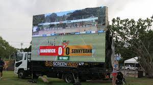 Big screen truck for entertaining large audiences in all weather conditions