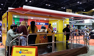What are the benefits of using an exhibition trailer at your next event?