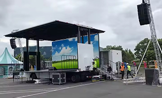 Exhibition truck with folding hydraulic stage for outdoor branding activities