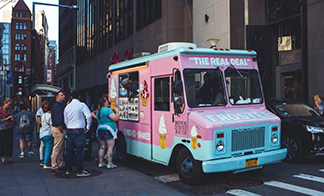 Outdoor Advertising Made Simple with a Van Stage Truck
